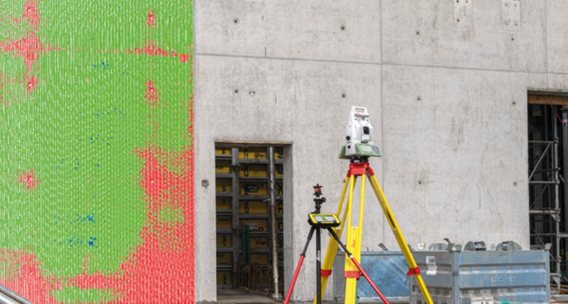 Construction worker on a yellow dozer with Leica iCON machine control system installed